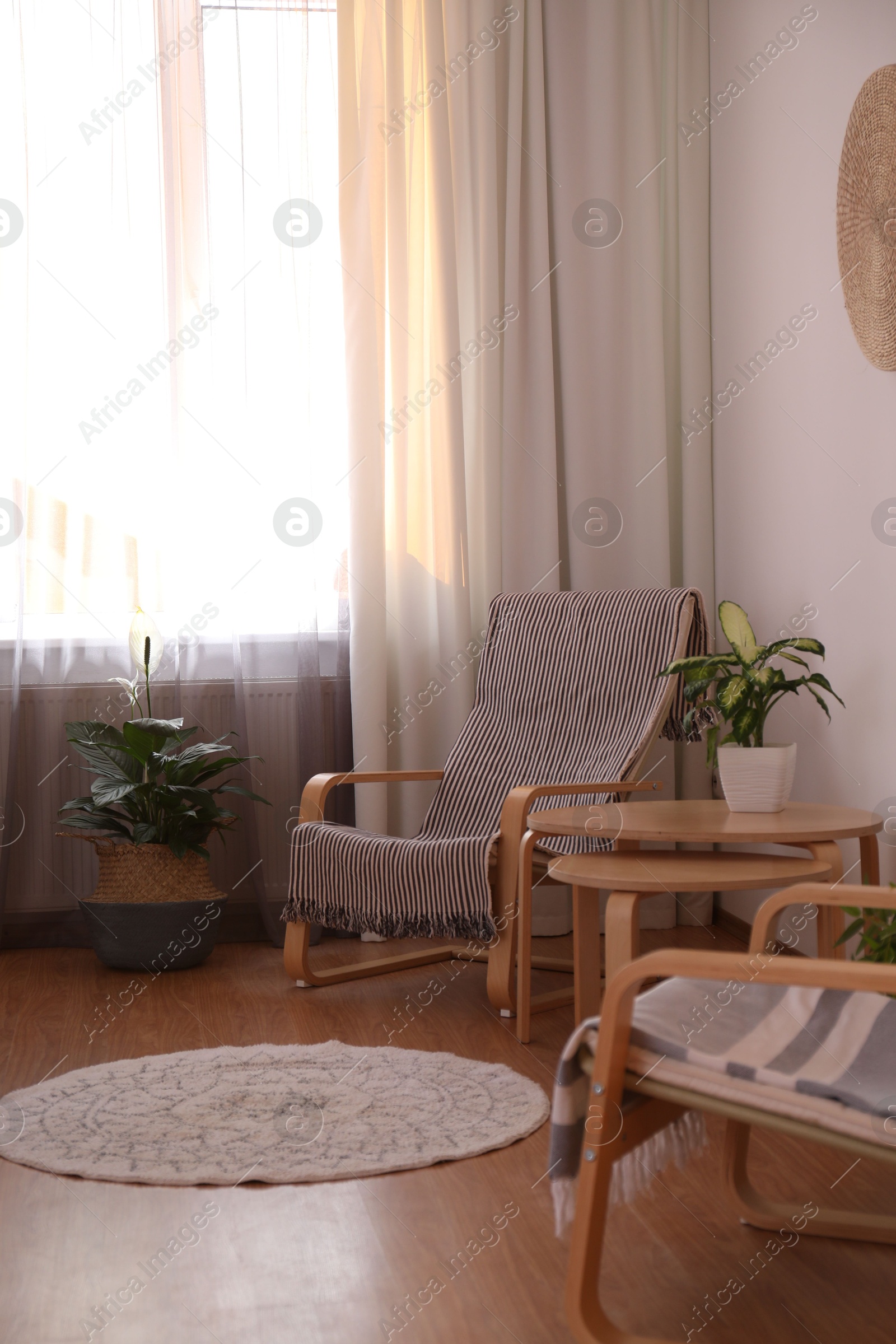 Window with stylish curtains in living room interior Photo of Window with stylish curtains in living room interior