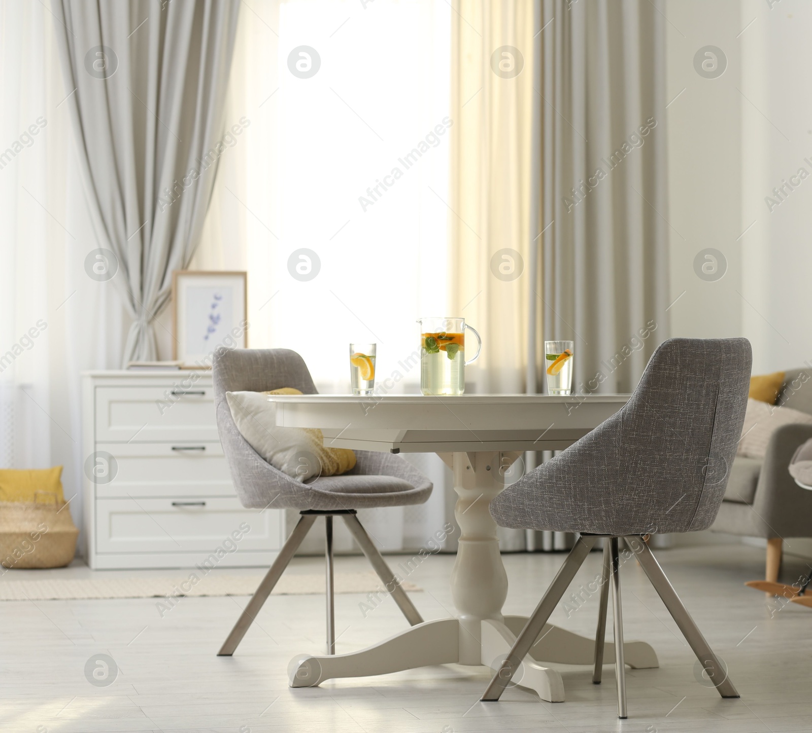 Modern living room interior with beautiful curtains on window Photo of Modern living room interior with beautiful curtains on window