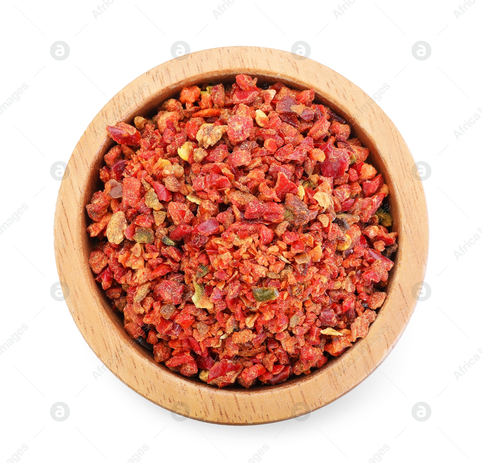 Red chili pepper flakes in bowl isolated on white, top view Photo of Red chili pepper flakes in bowl isolated on white, top view