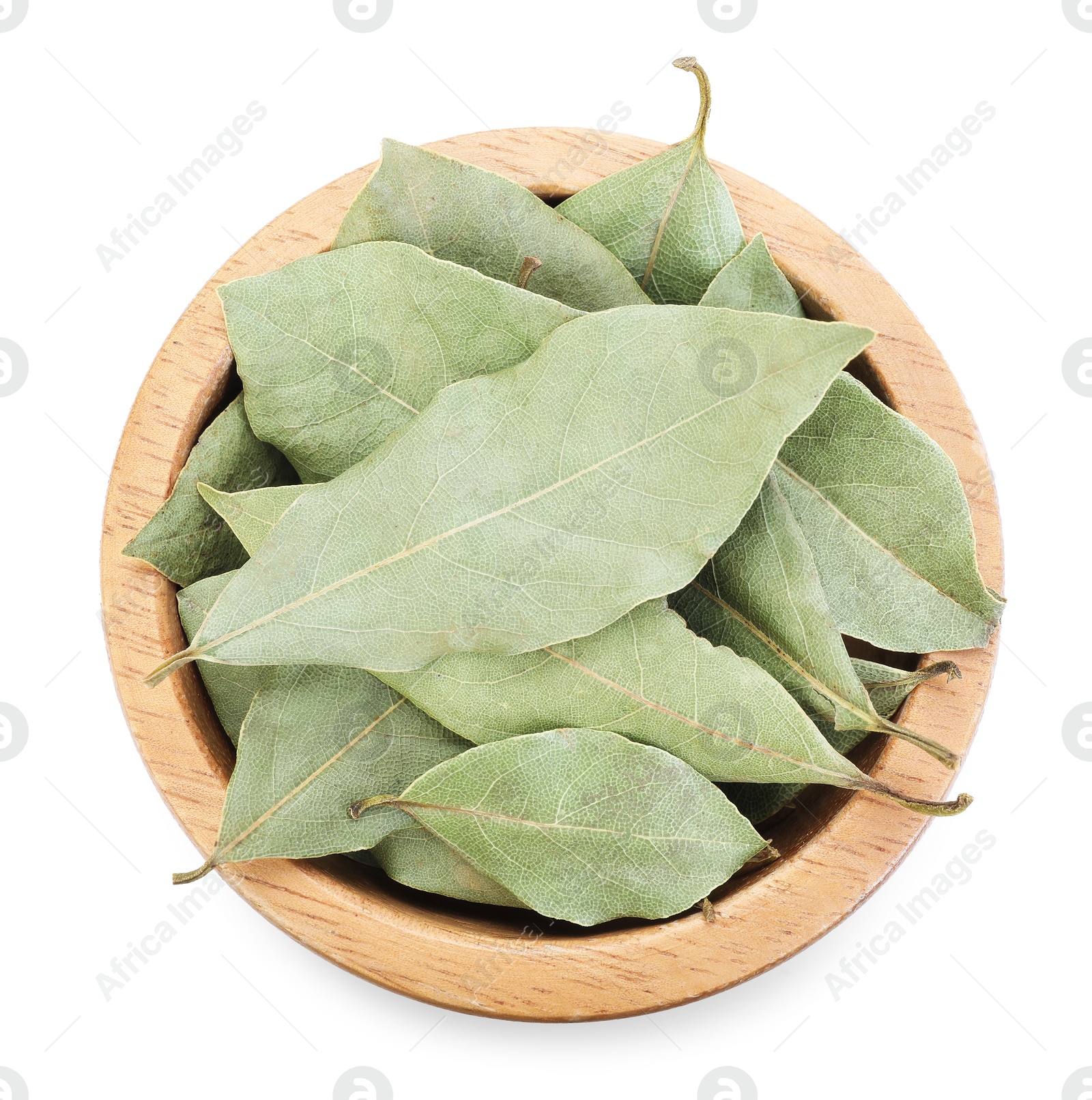 Aromatic bay leaves in bowl isolated on white, top view Photo of Aromatic bay leaves in bowl isolated on white, top view