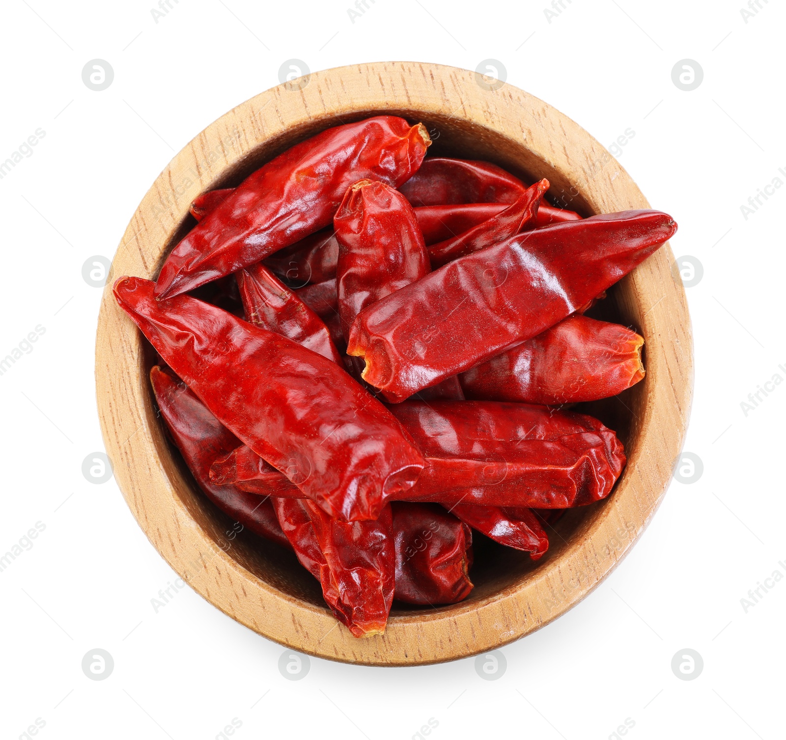 Dried red chili pepper in bowl isolated on white, top view Photo of Dried red chili pepper in bowl isolated on white, top view