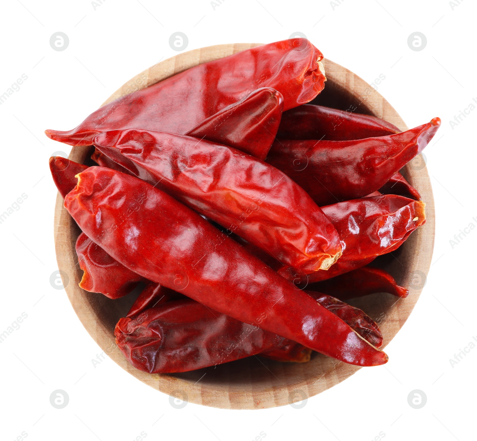 Dried red chili pepper in bowl isolated on white, top view Photo of Dried red chili pepper in bowl isolated on white, top view