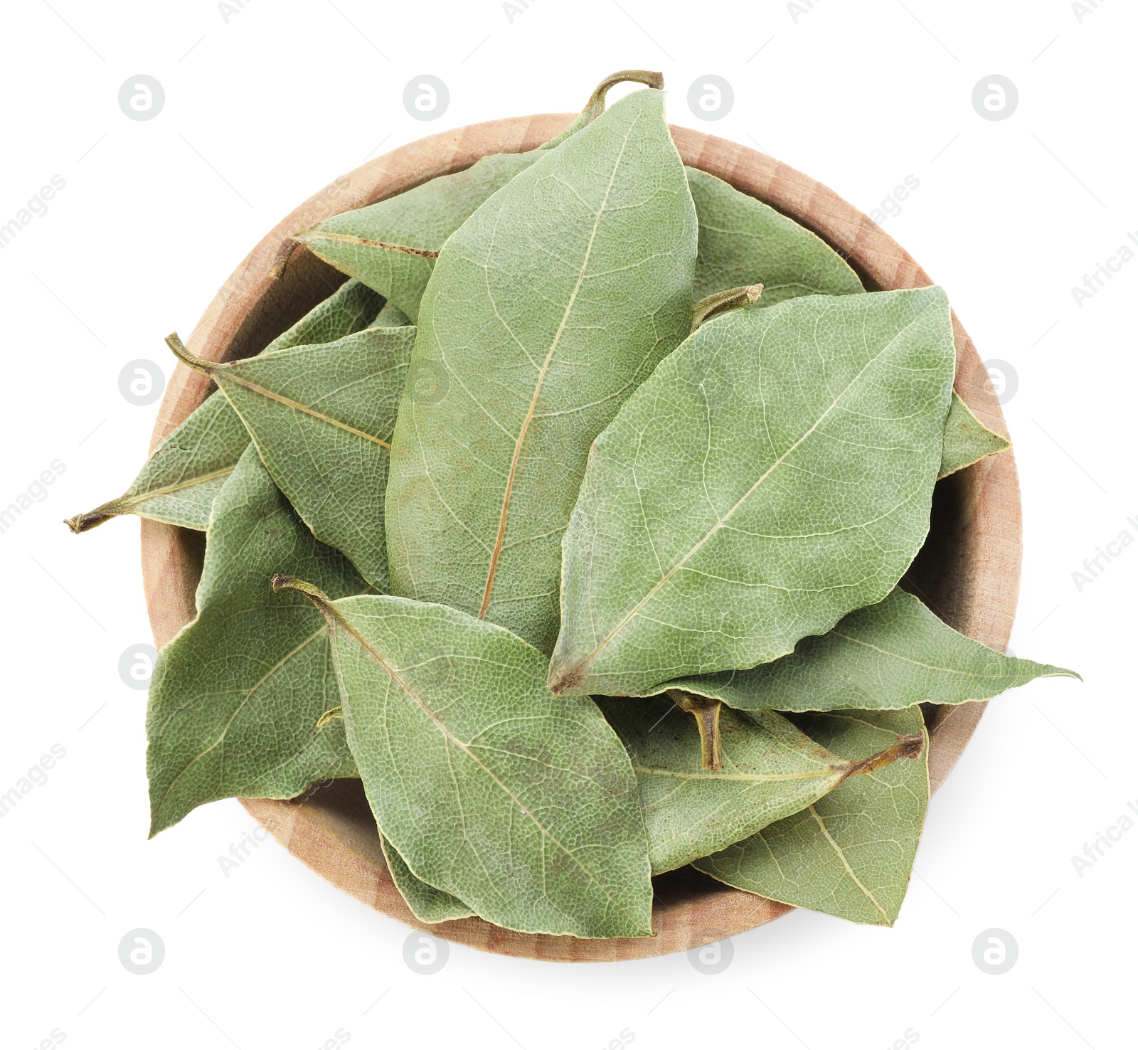 Aromatic bay leaves in bowl isolated on white, top view Photo of Aromatic bay leaves in bowl isolated on white, top view