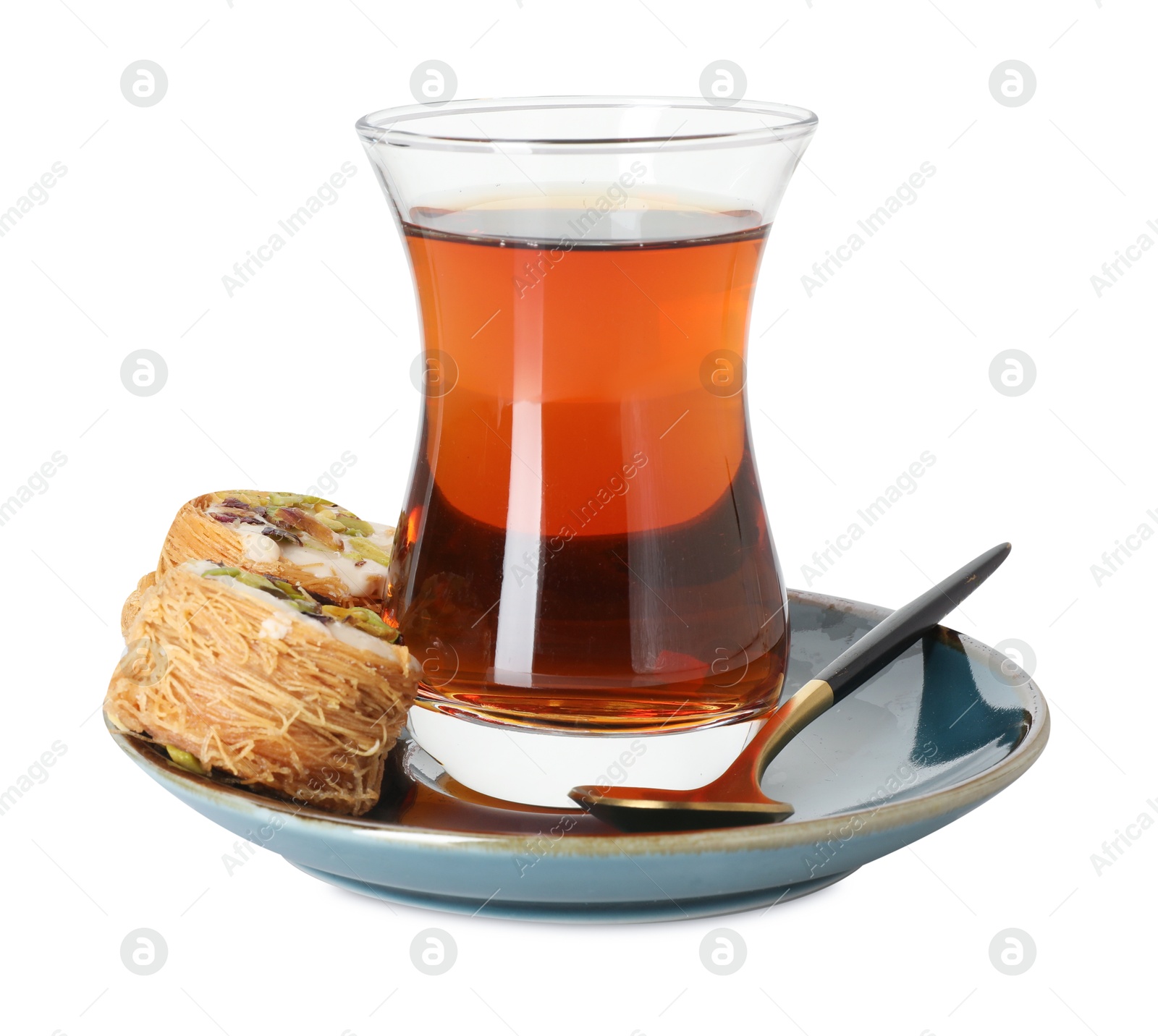Tasty Turkish tea and delight isolated on white Photo of Tasty Turkish tea and delight isolated on white