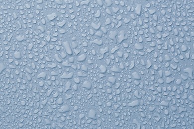 Image of Many water drops on light blue background