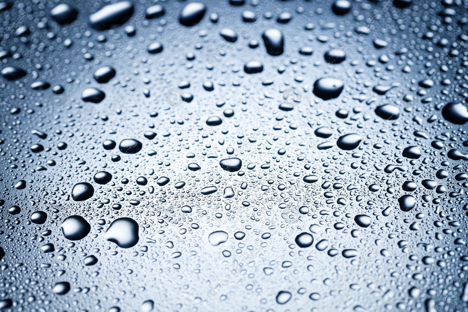 Many water drops on glass surface, closeup Image of Many water drops on glass surface, closeup