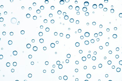Image of Soda water with bubbles as background, closeup