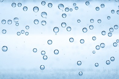 Image of Soda water with bubbles as background, closeup