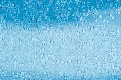 Image of Soda water with bubbles as background, closeup