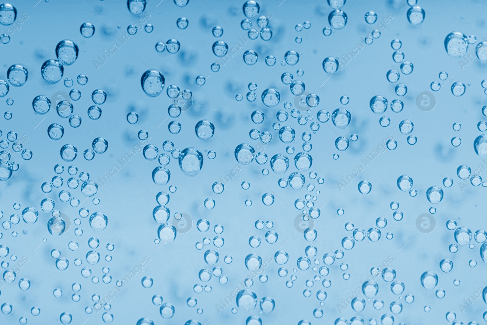 Image of Soda water with bubbles as background, closeup