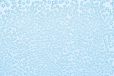 Image of Soda water with bubbles as background, closeup