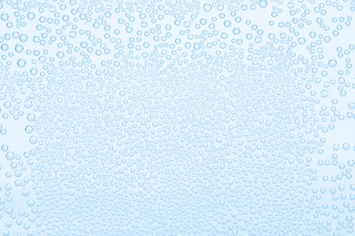 Image of Soda water with bubbles as background, closeup