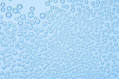 Image of Soda water with bubbles as background, closeup