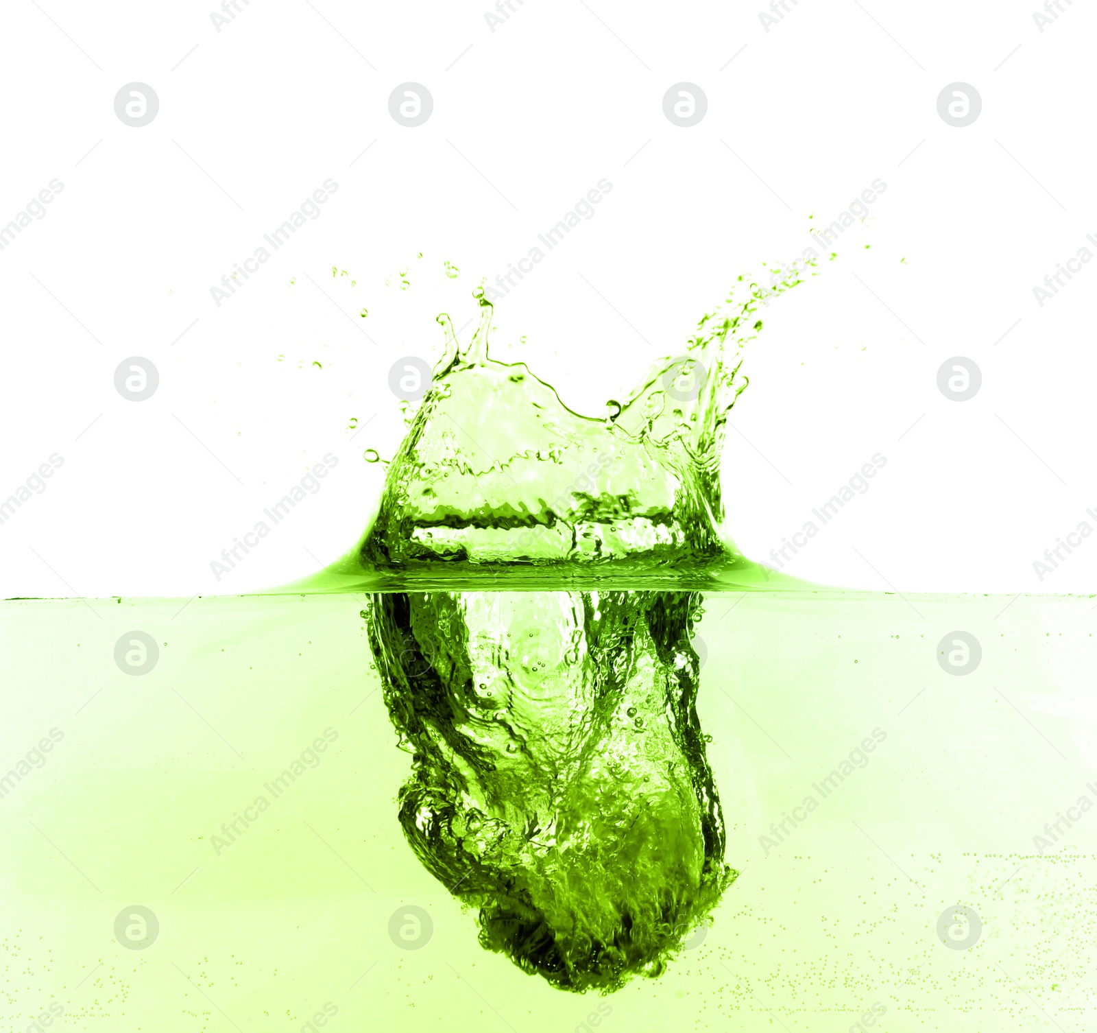 Beautiful green water splashing against white background Image of Beautiful green water splashing against white background