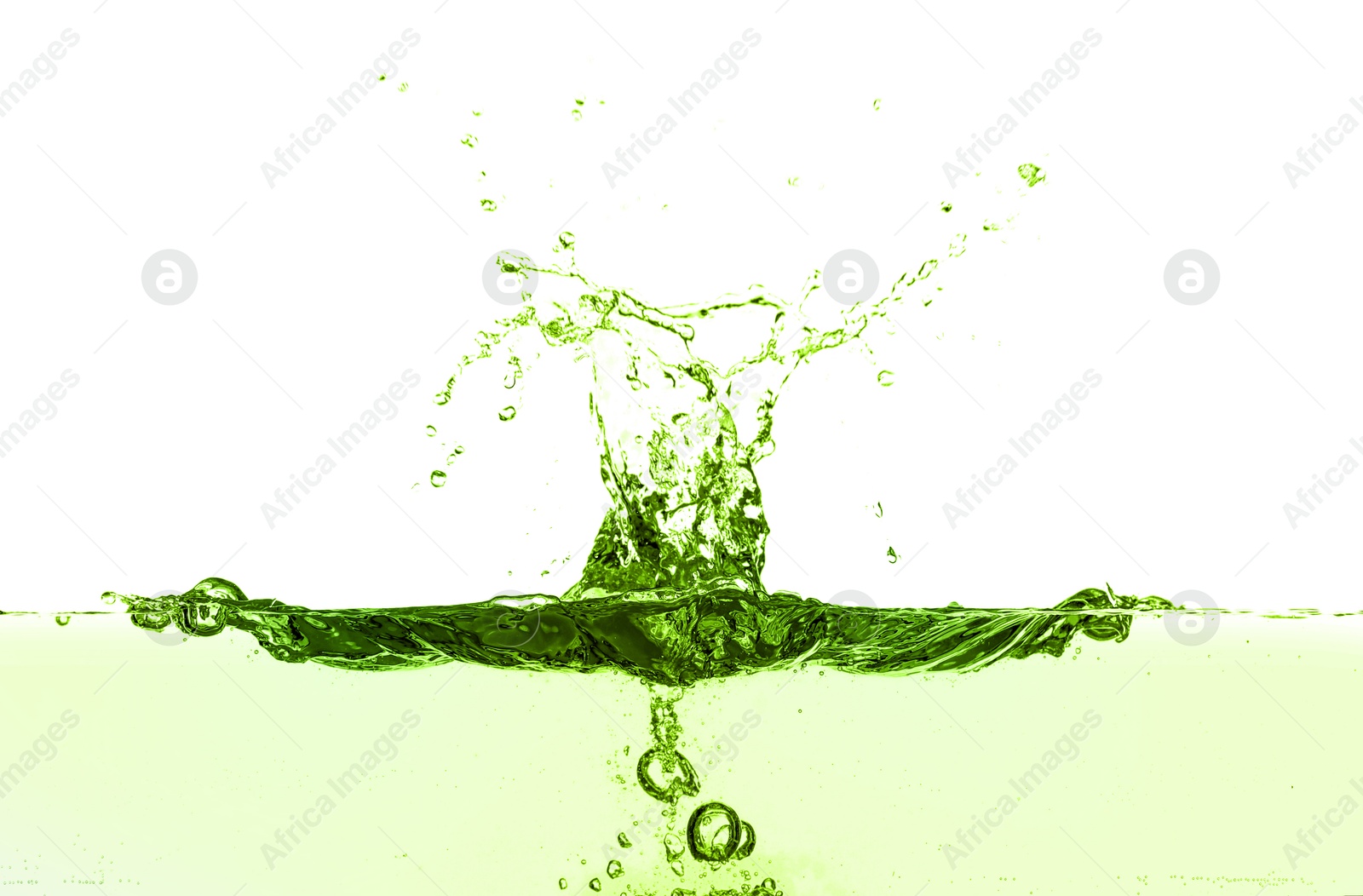 Beautiful green water splashing against white background Image of Beautiful green water splashing against white background