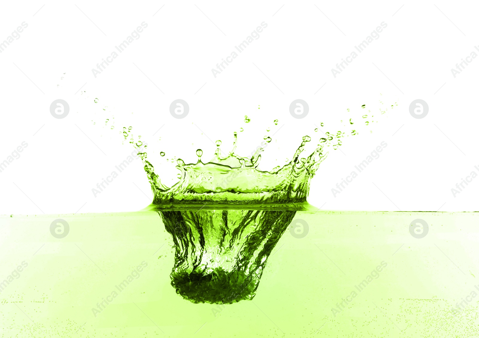 Beautiful green water splashing against white background Image of Beautiful green water splashing against white background