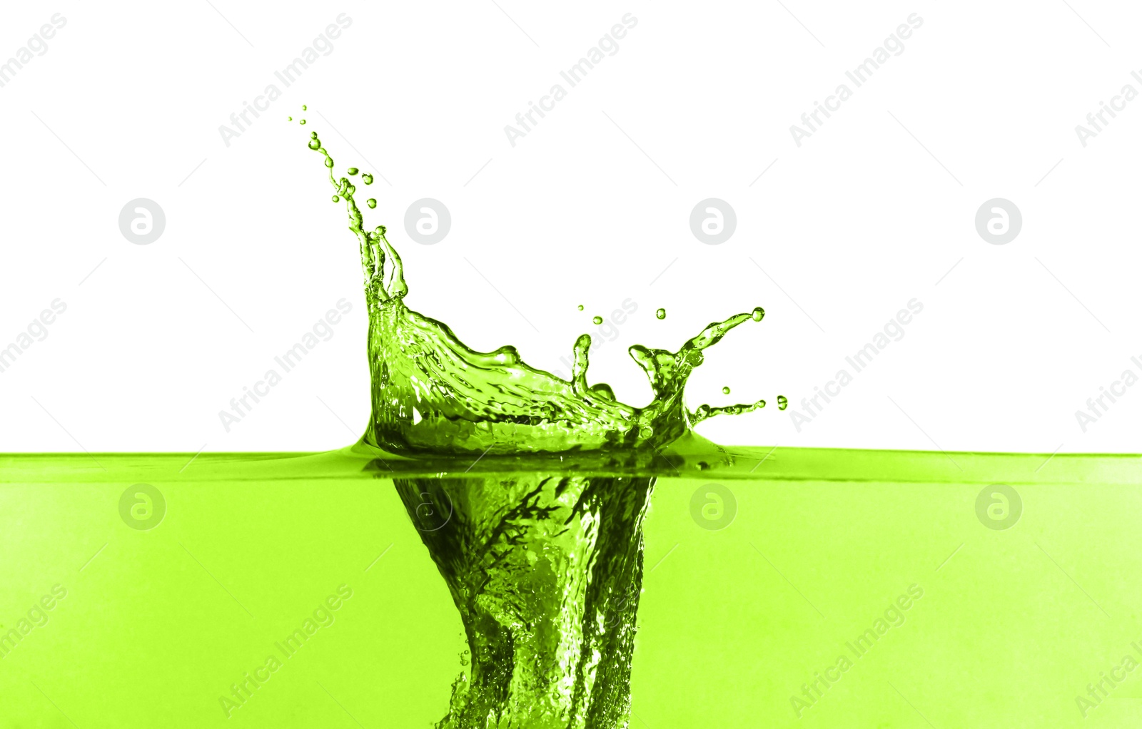 Beautiful green water splashing against white background Image of Beautiful green water splashing against white background