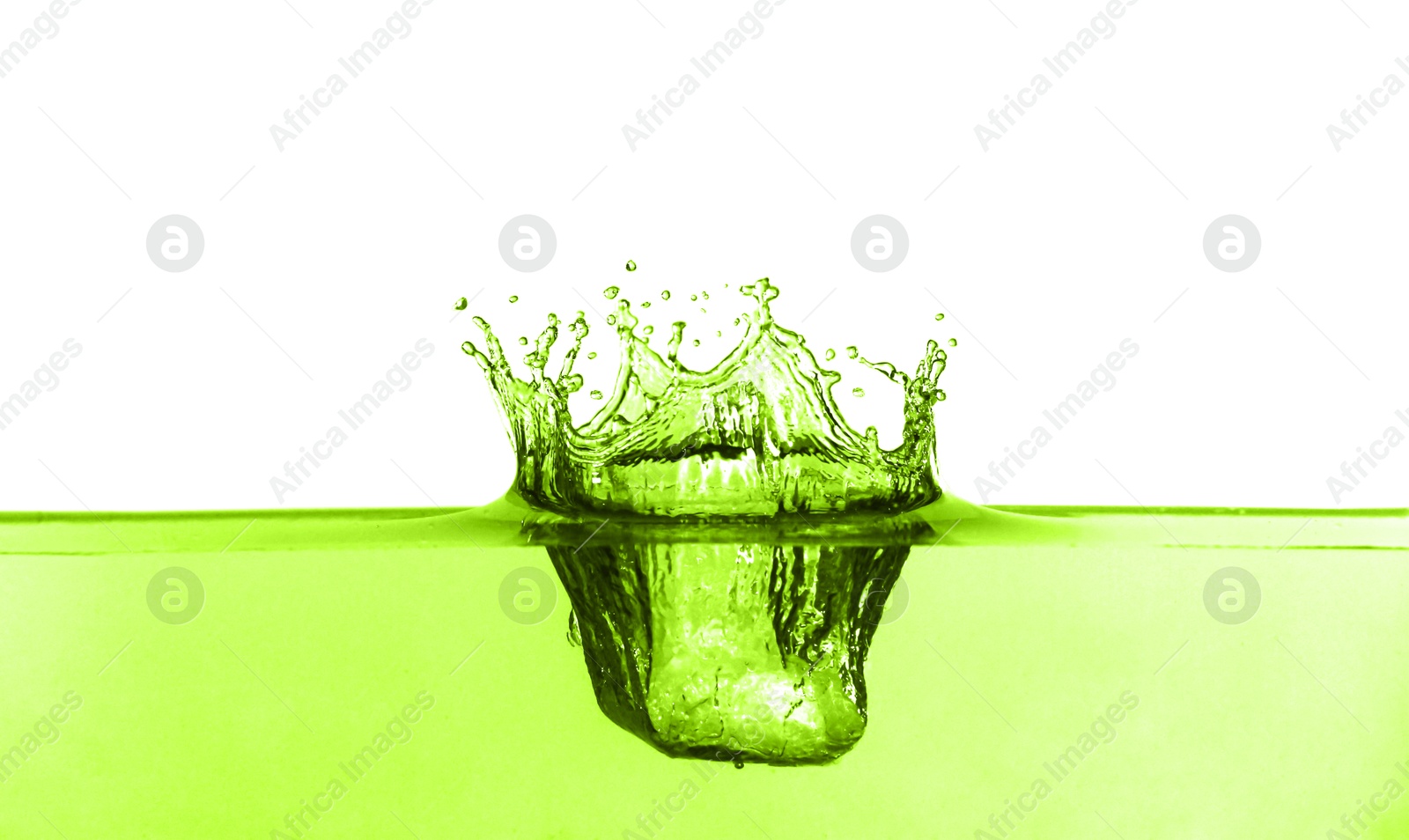 Beautiful green water splashing against white background Image of Beautiful green water splashing against white background