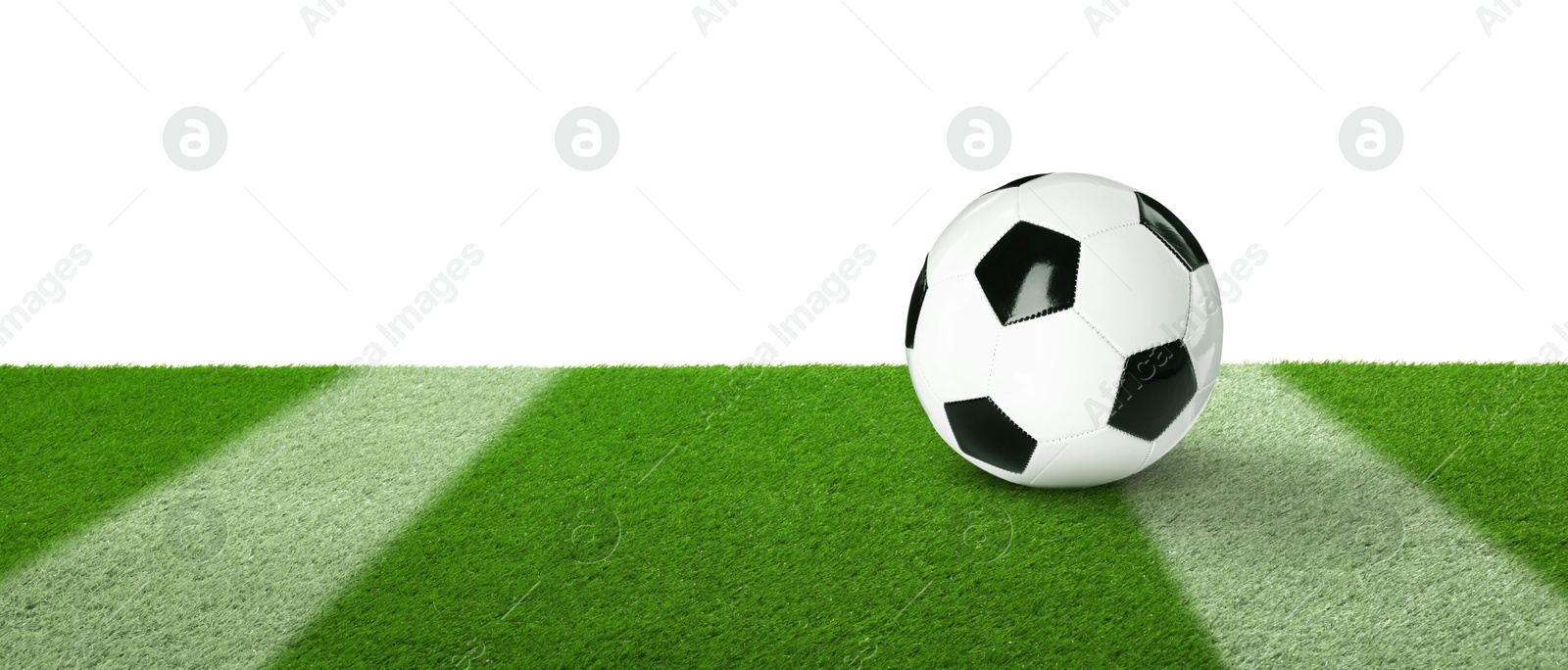 Soccer ball on football field against white background, space for text. Banner Image of Soccer ball on football field against white background, space for text. Banner