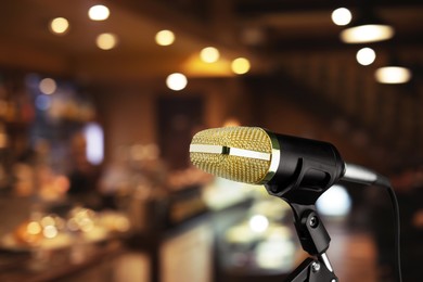 Image of Microphone on stage in restaurant. Singer's performance