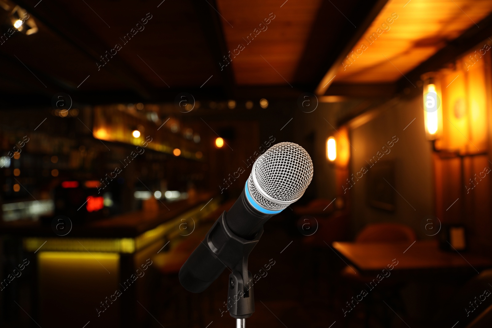 Microphone on stage in restaurant. Singer's performance Image of Microphone on stage in restaurant. Singer's performance