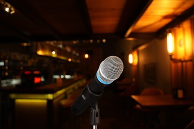 Image of Microphone on stage in restaurant. Singer's performance