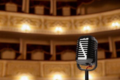 Image of Microphone on stage in concert hall. Singer's performance