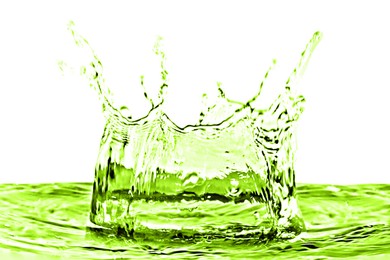 Image of Beautiful green water splashing against white background