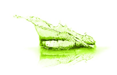 Image of Beautiful green water splashing against white background