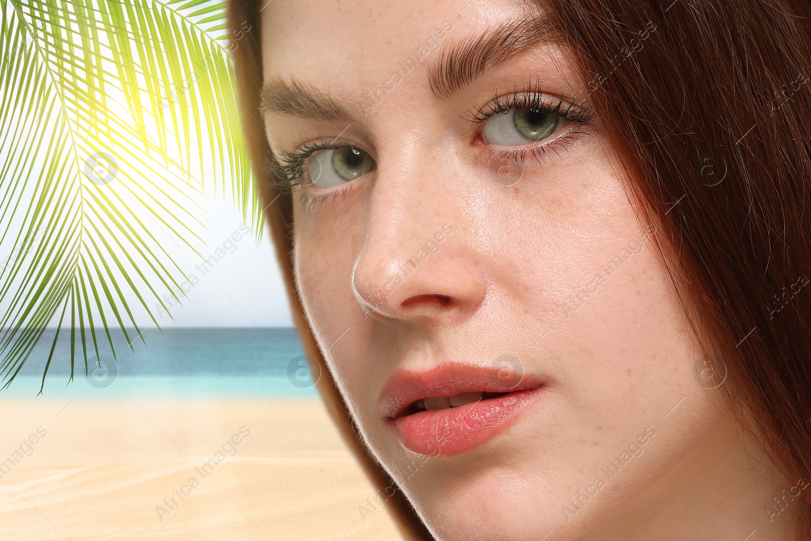 Beautiful young woman with freckles on beach, closeup Image of Beautiful young woman with freckles on beach, closeup