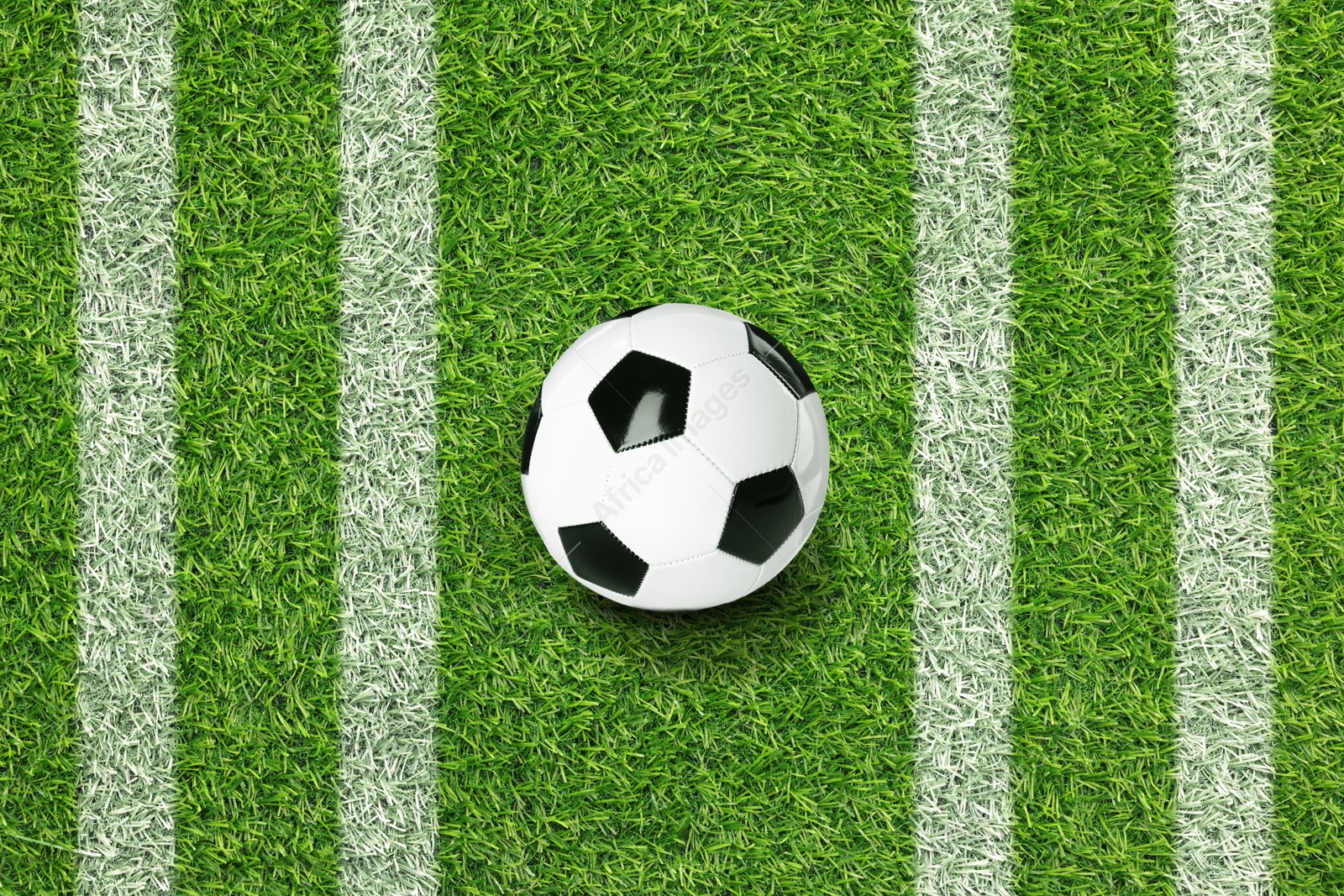 Soccer ball on football field with markings Image of Soccer ball on football field with markings