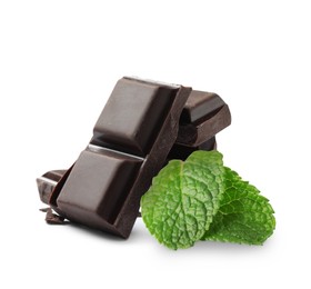 Image of Dark chocolate pieces and mint leaves on white background