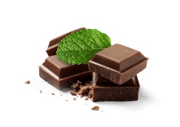 Image of Milk chocolate pieces and mint leaf on white background