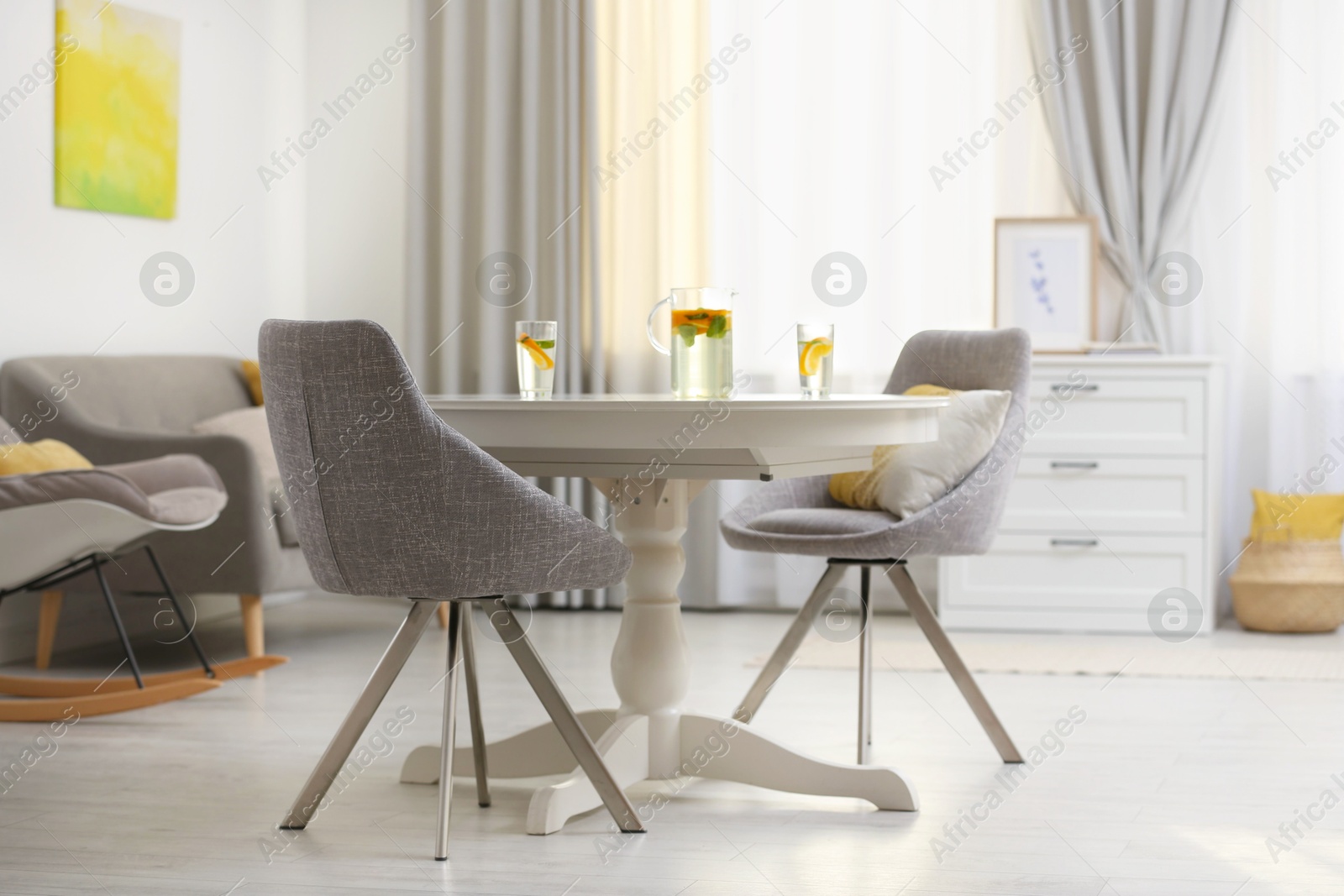 Modern living room interior with beautiful curtains on window Photo of Modern living room interior with beautiful curtains on window