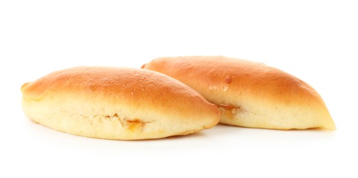 Photo of Two tasty baked patties isolated on white