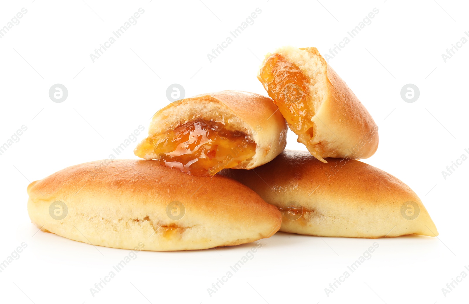 Tasty baked patties with orange jam isolated on white Photo of Tasty baked patties with orange jam isolated on white
