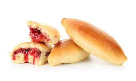 Photo of Tasty baked patties with strawberry filling isolated on white