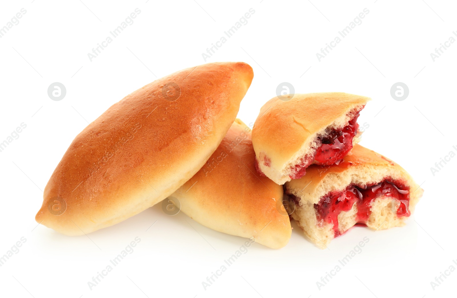Tasty baked patties with strawberry filling isolated on white Photo of Tasty baked patties with strawberry filling isolated on white