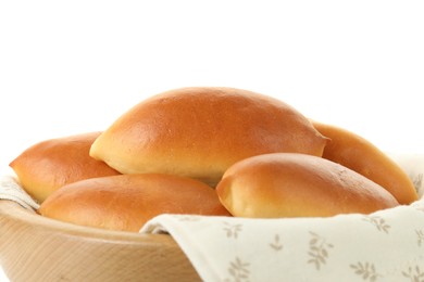 Photo of Tasty baked patties in wooden bowl on white background, closeup