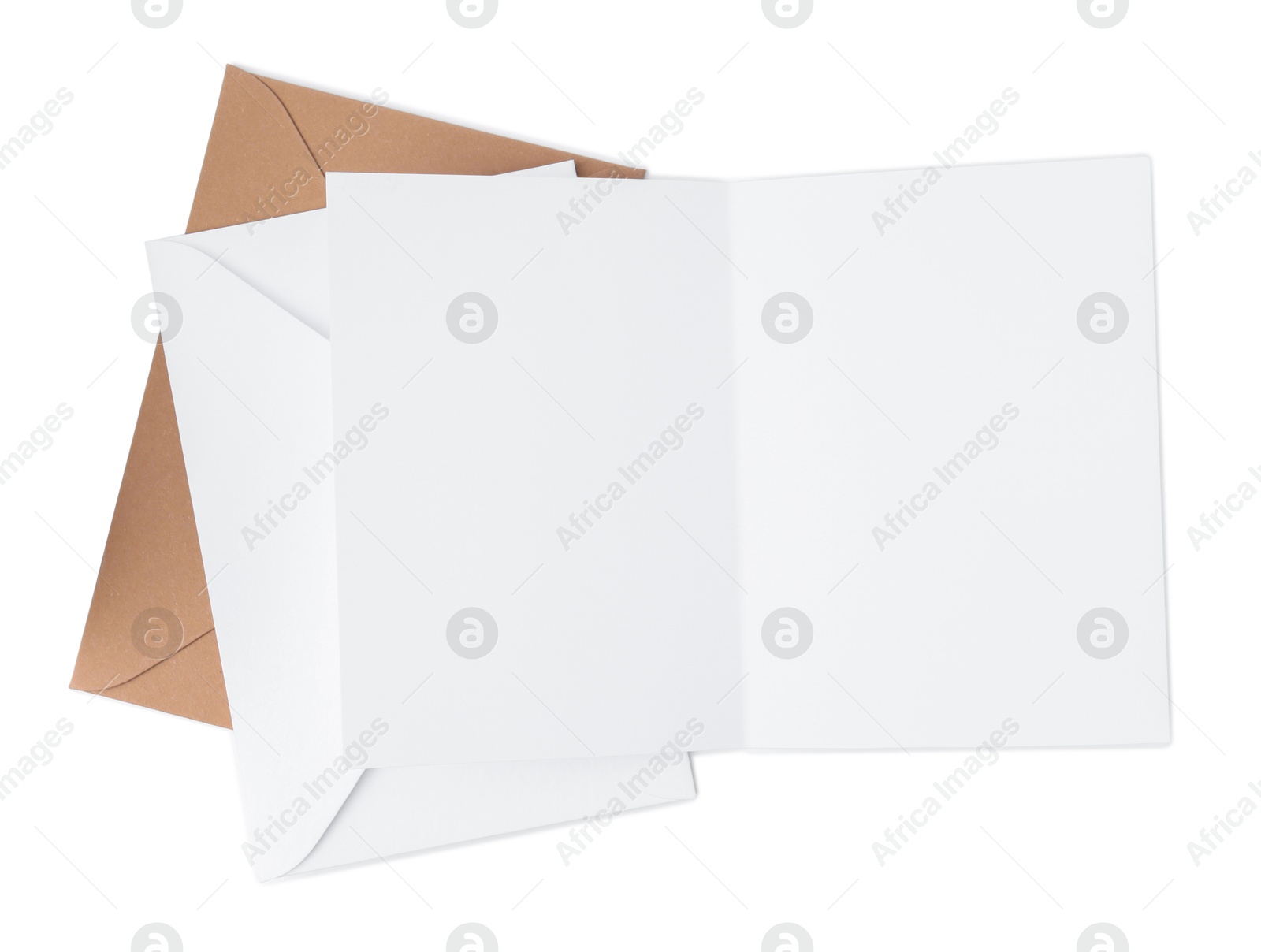 Photo of Blank greeting card and paper envelopes on white background, top view