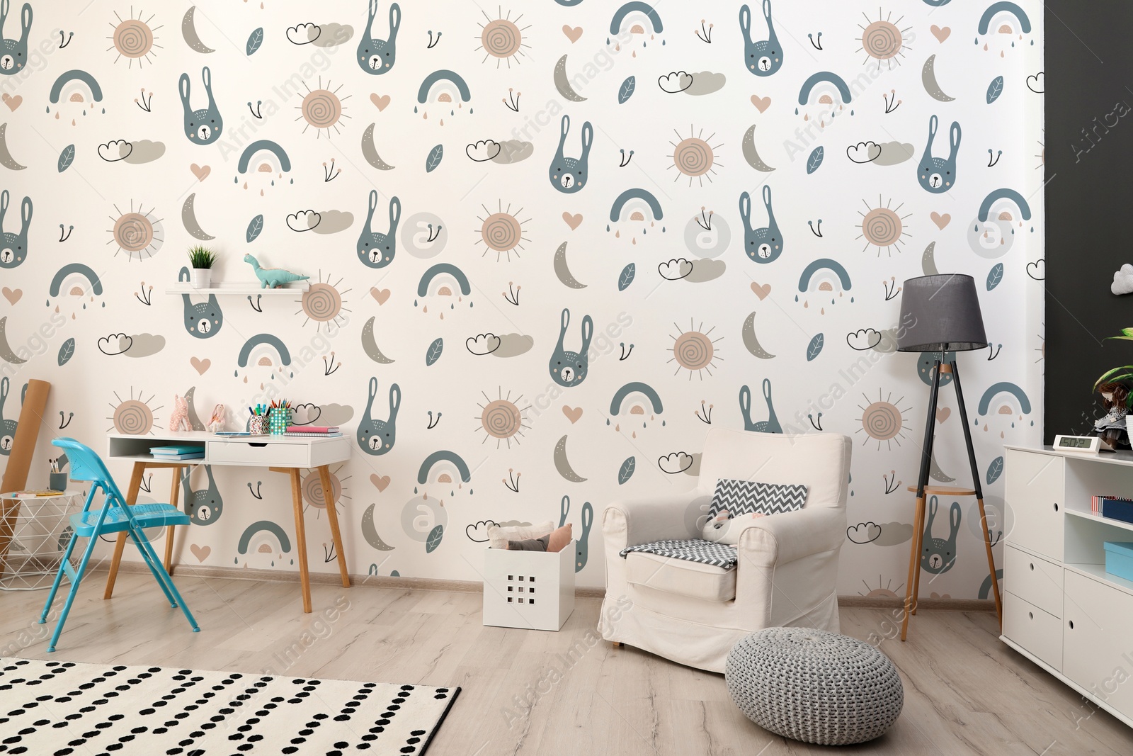Cozy children's room with stylish furniture and cute wallpaper. Stylish interior Image of Cozy children's room with stylish furniture and cute wallpaper. Stylish interior