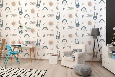 Image of Cozy children's room with stylish furniture and cute wallpaper. Stylish interior