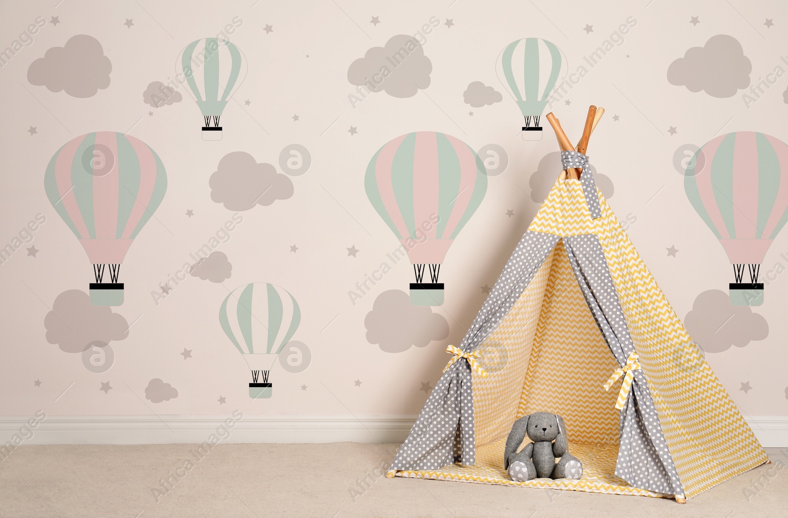 Cozy children's room with play tent and cute wallpaper. Stylish playroom interior Image of Cozy children's room with play tent and cute wallpaper. Stylish playroom interior