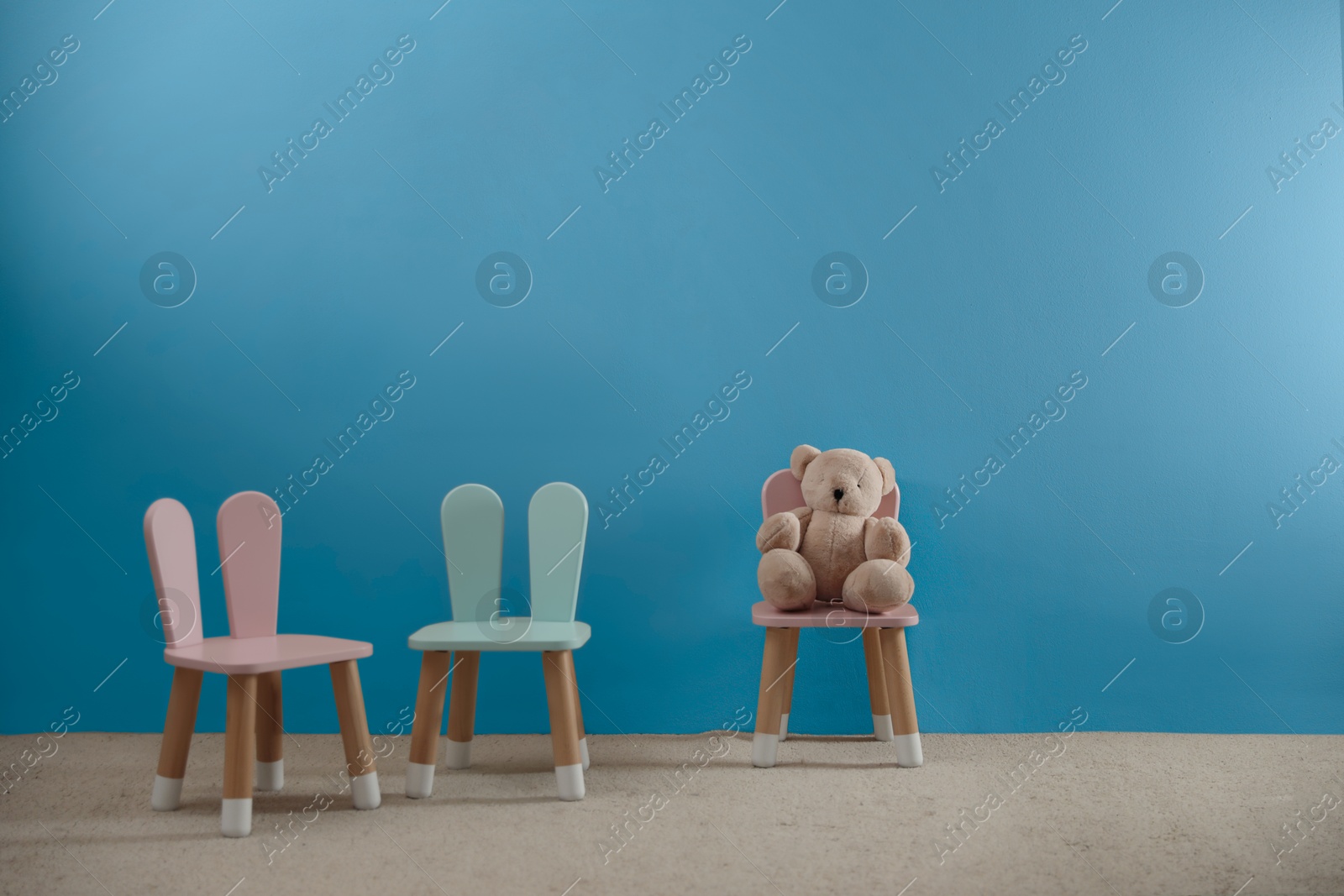 Cozy playroom with toy and cute small chairs. Children's room interior Image of Cozy playroom with toy and cute small chairs. Children's room interior