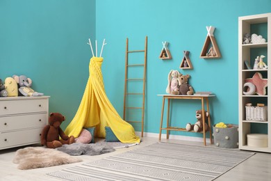 Image of Cozy playroom with toys and furniture. Stylish children's room interior