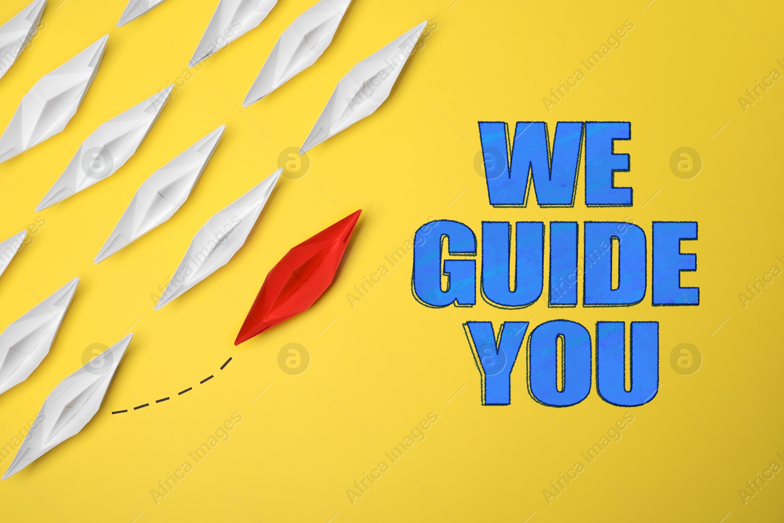 We guide you. Red paper boat among white ones on yellow background, top view Image of We guide you. Red paper boat among white ones on yellow background, top view