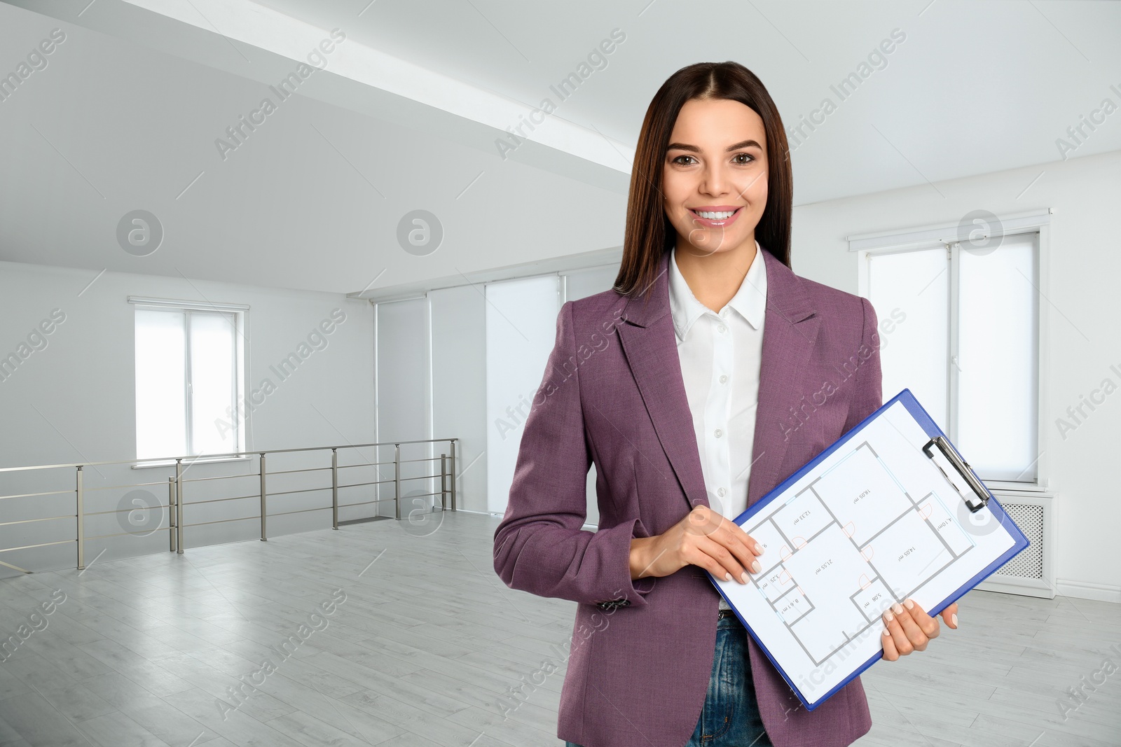 Real estate agent holding clipboard with house plan in apartment Image of Real estate agent holding clipboard with house plan in apartment