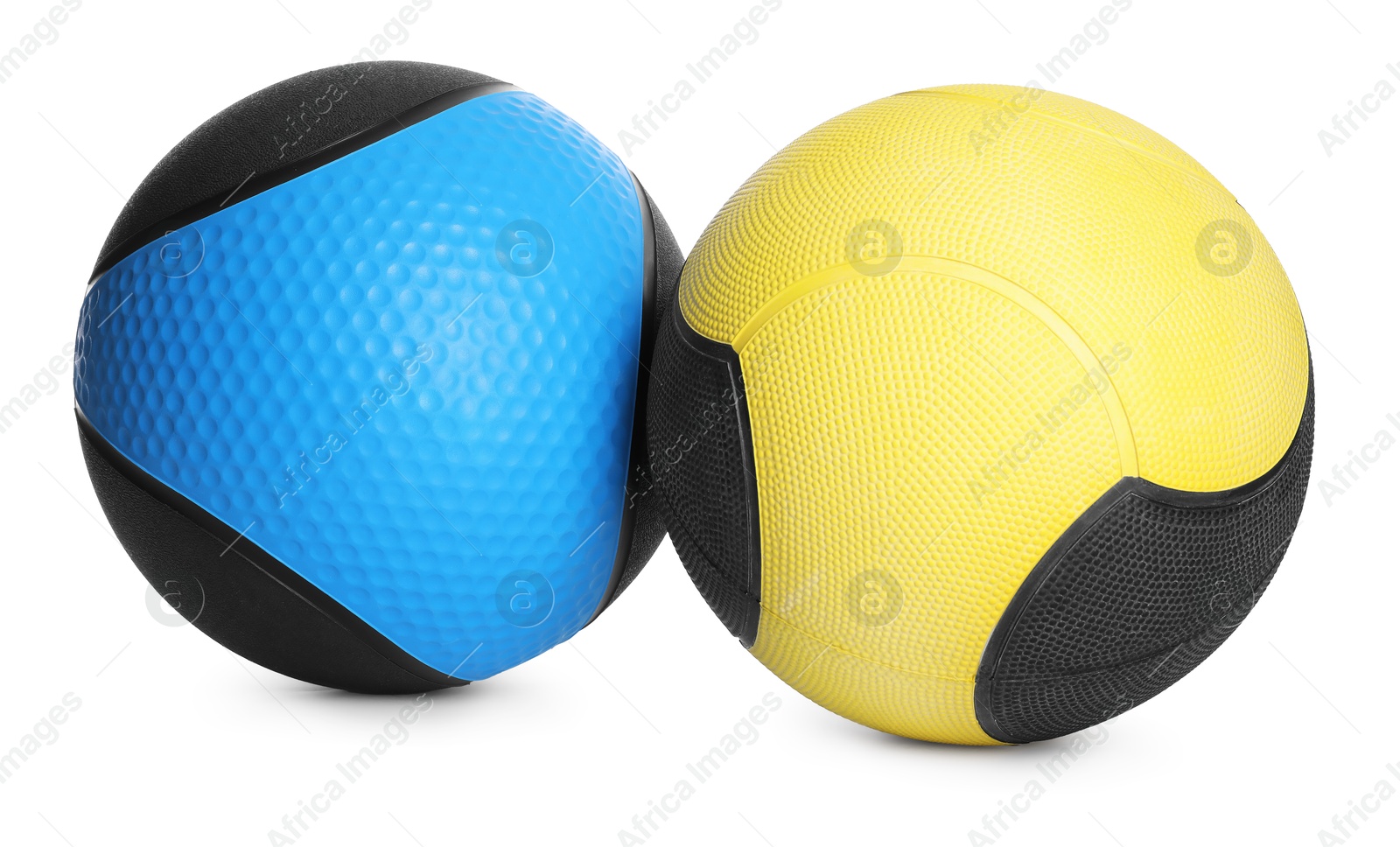 Medicine balls on white background. Sport equipment Photo of Medicine balls on white background. Sport equipment