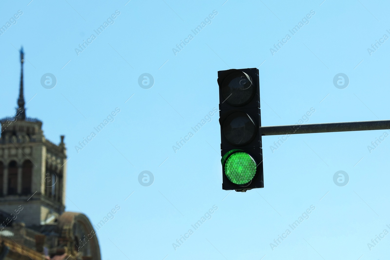 View of traffic light against blue sky Photo of View of traffic light against blue sky