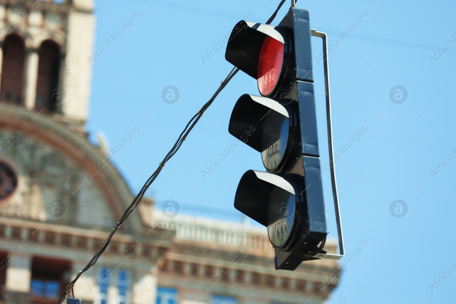 View of traffic light against blue sky Photo of View of traffic light against blue sky